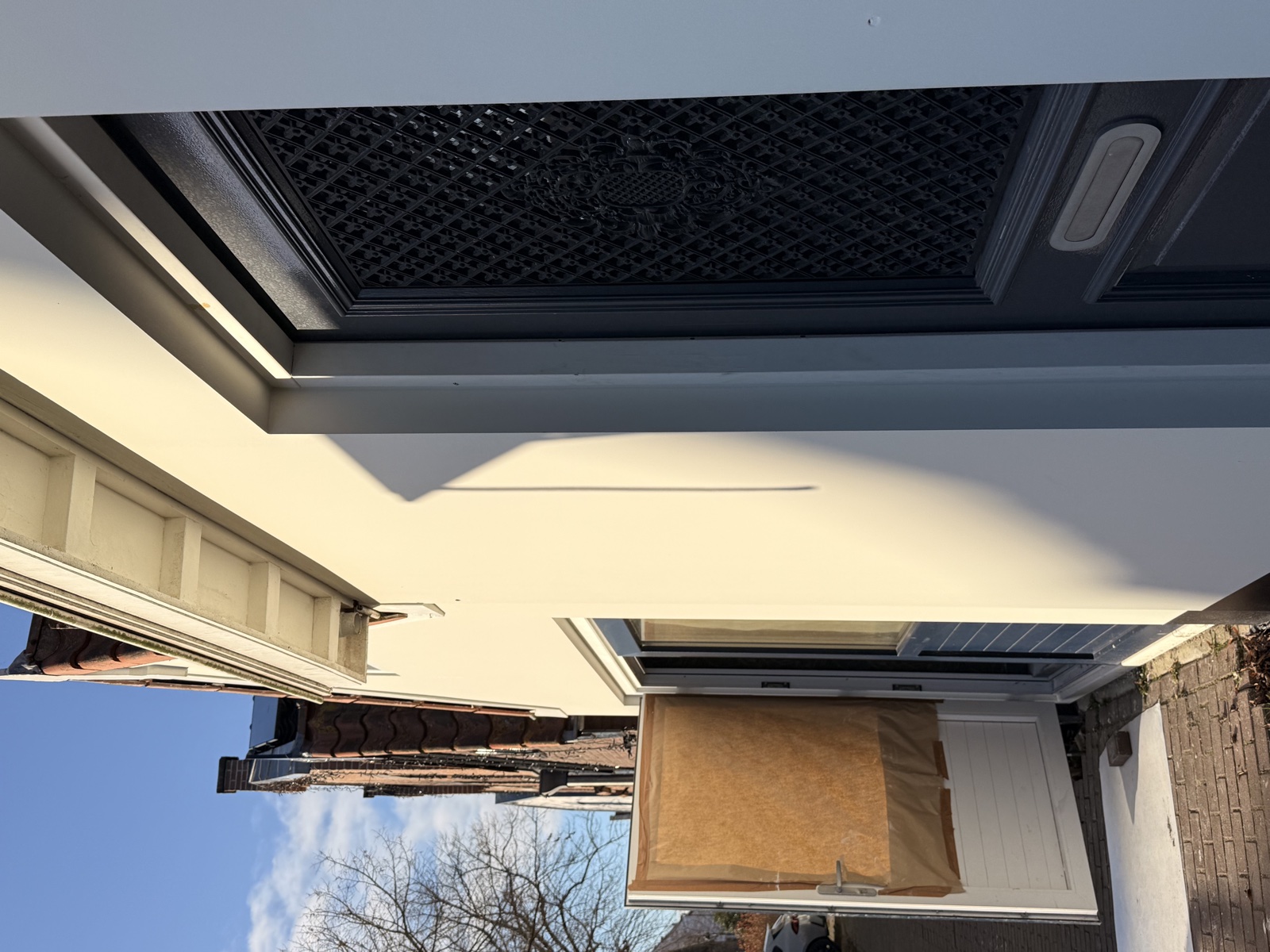 Glad gevelstucwerk door Stucologie — strijklichttest